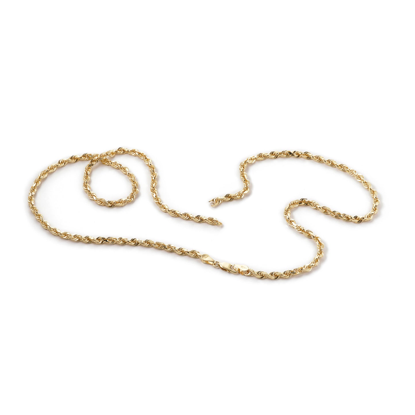 Broken gold chain necklace on a white background