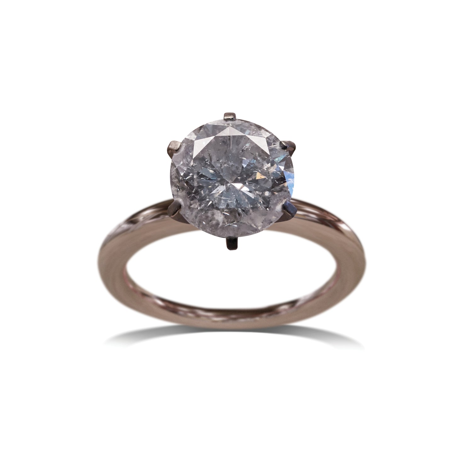 Rose gold engagement ring with prong damage