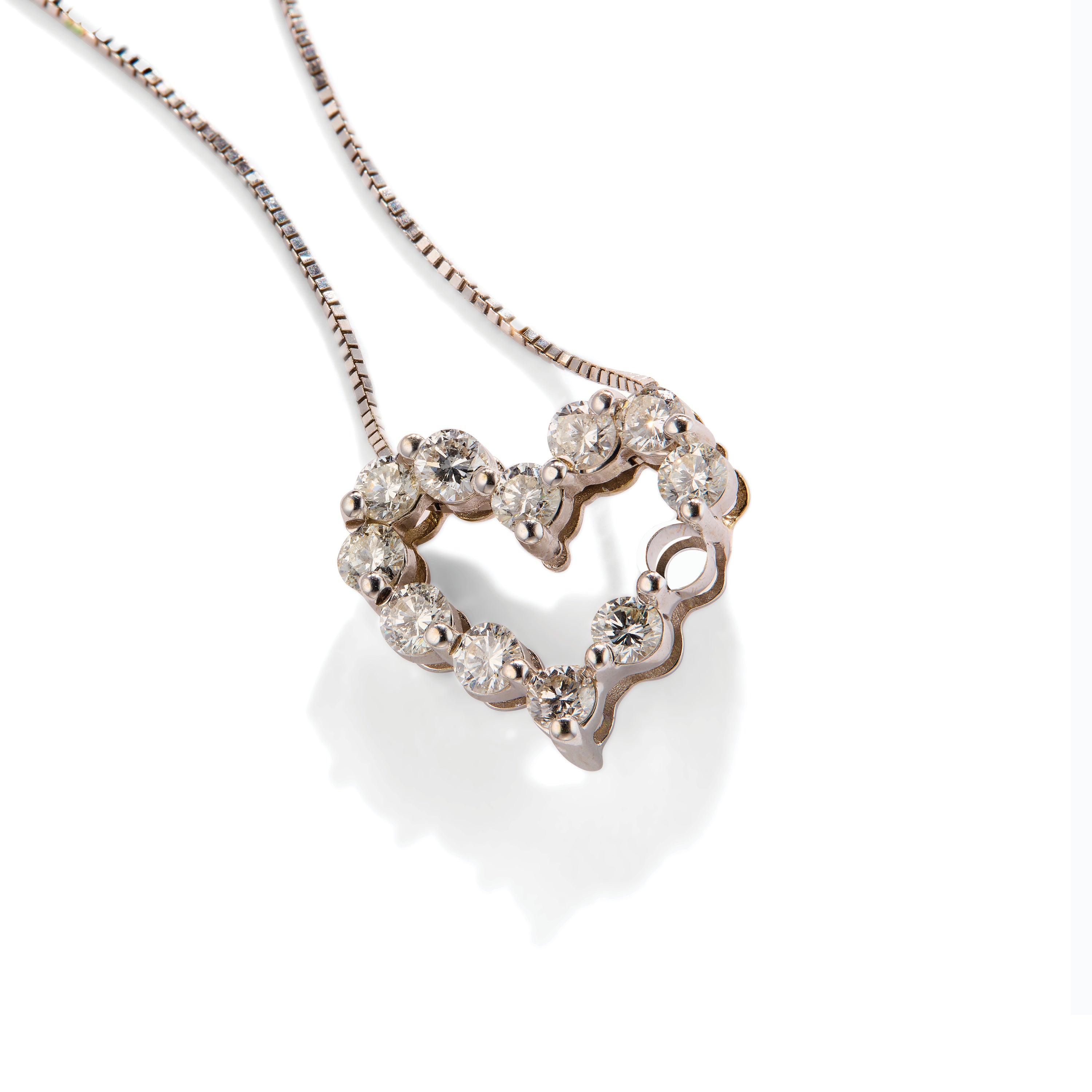 Heart shaped necklace with missing diamond