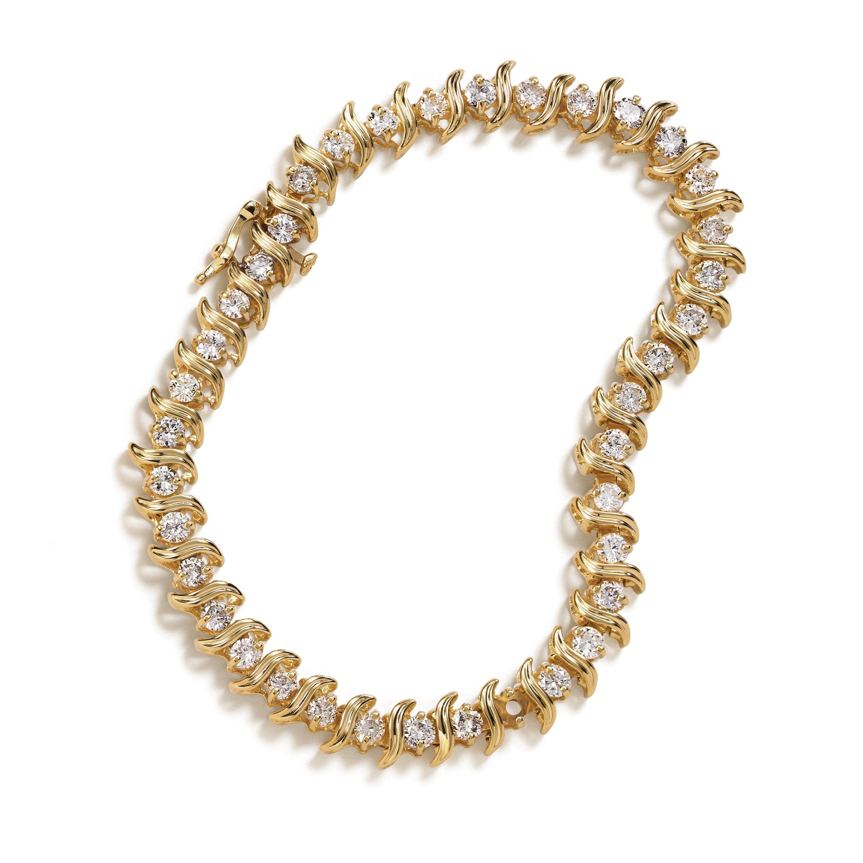 Gold and diamond bracelet with missing stone on a white background