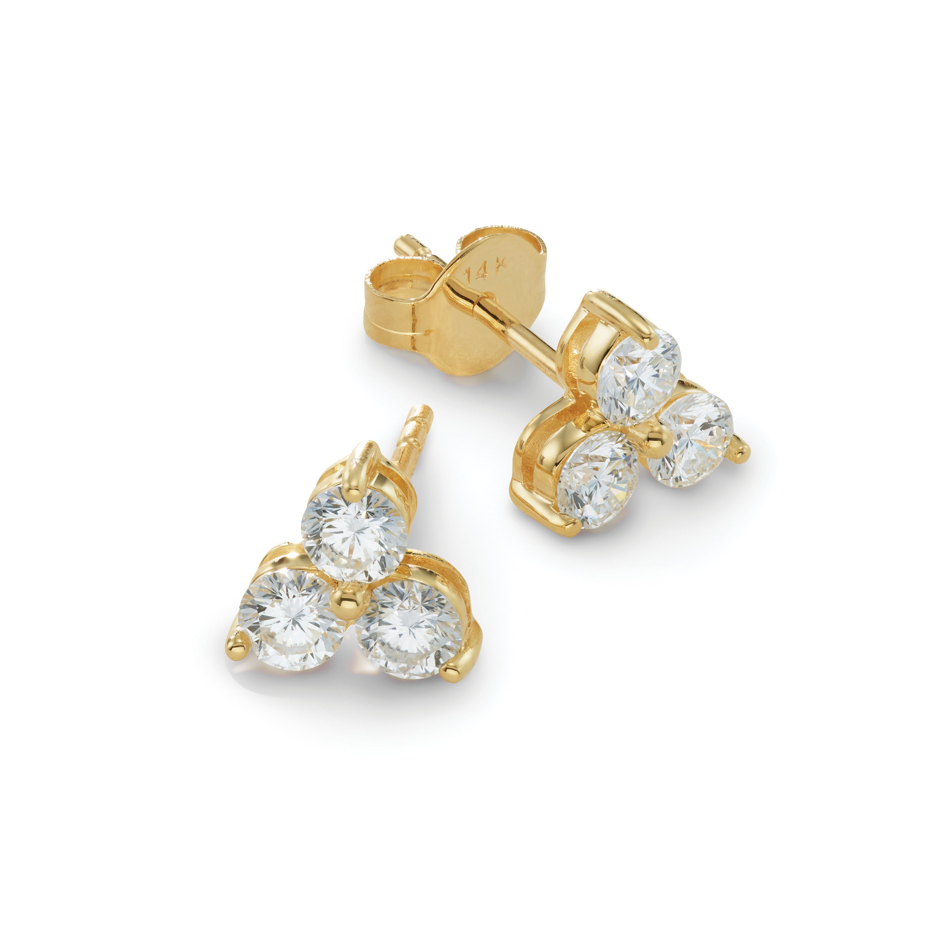 Gold earrings with diamond clusters on a white background
