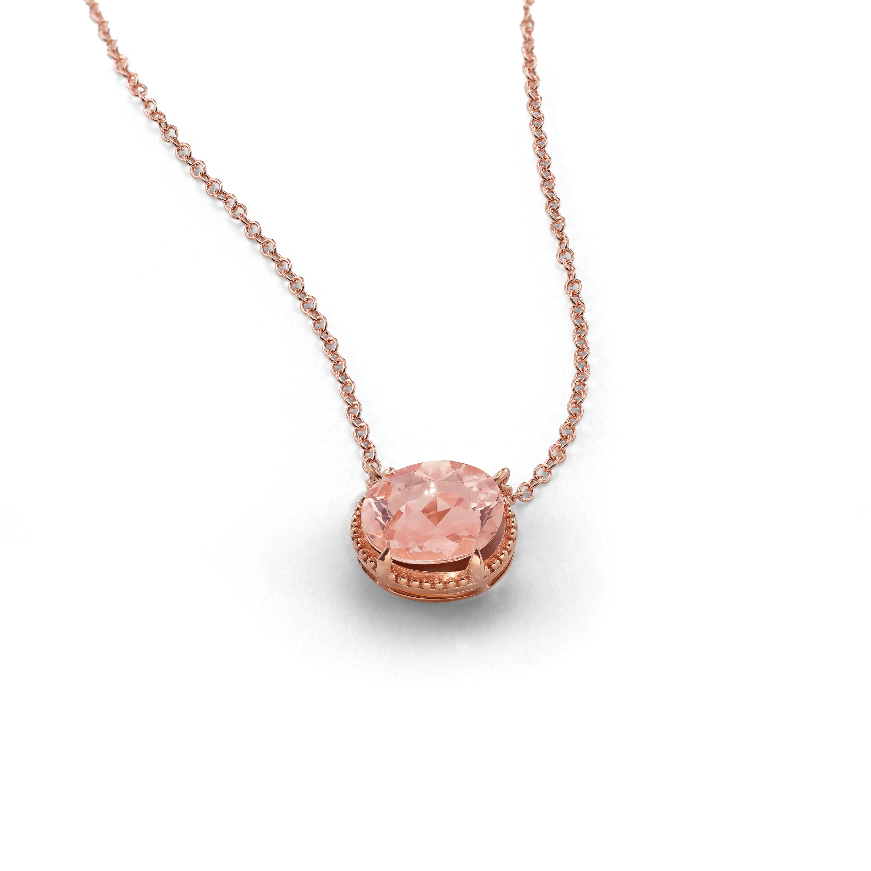 Rose gold necklace with a pendant containing a loose stone