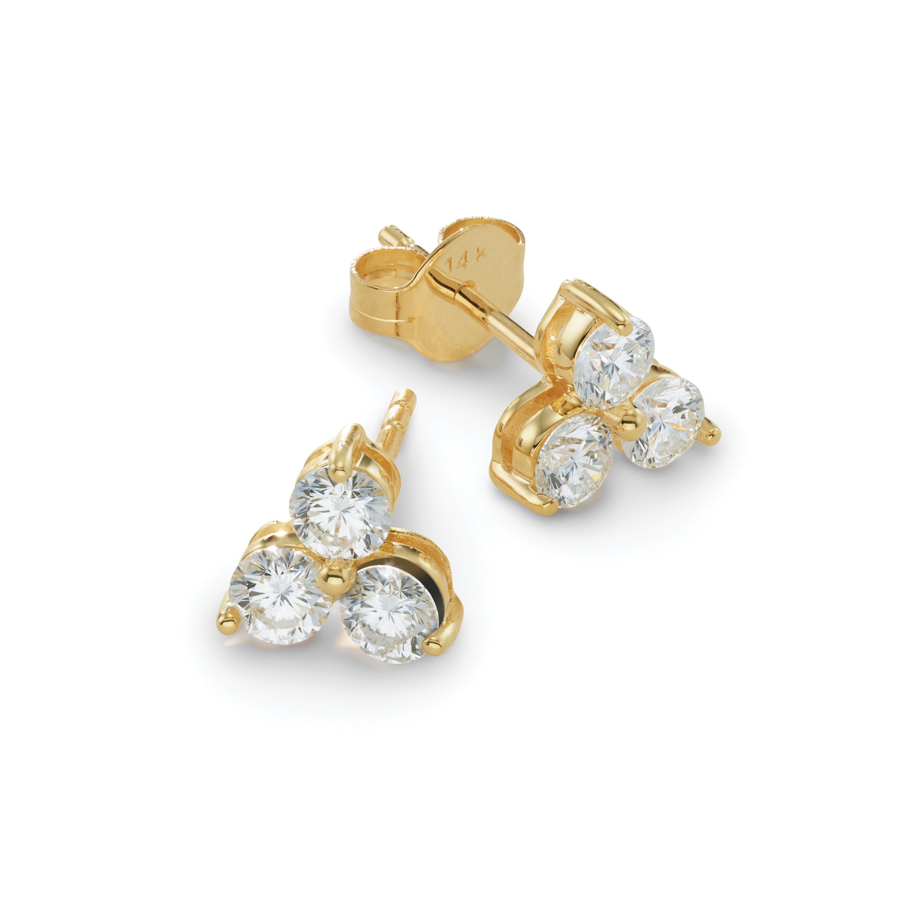 Gold earrings with loose diamond shown on a white background