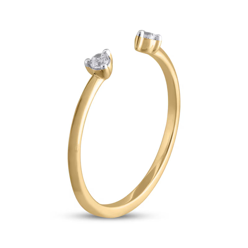 A yellow gold open ring with two diamonds