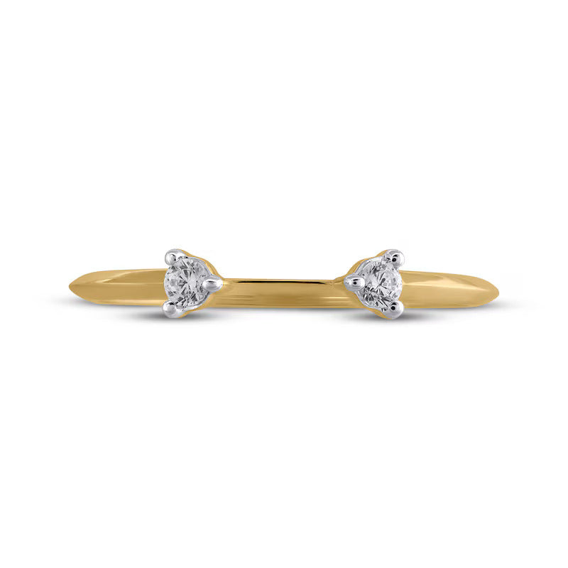 Gold ring with two diamond stones on a white background
